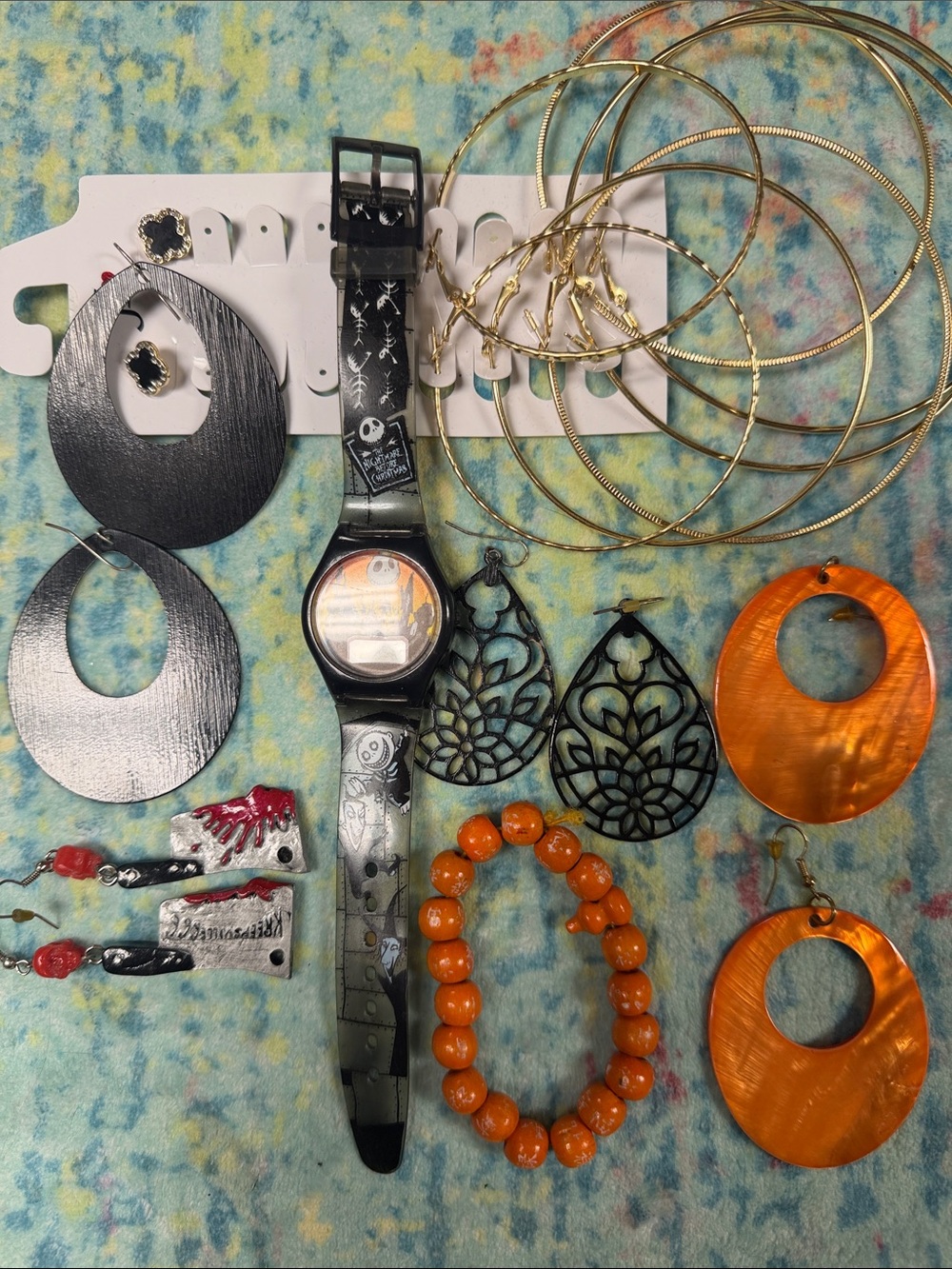Lot of nightmare b4 Xmas watch, 8 sets of earrings and a bracelet